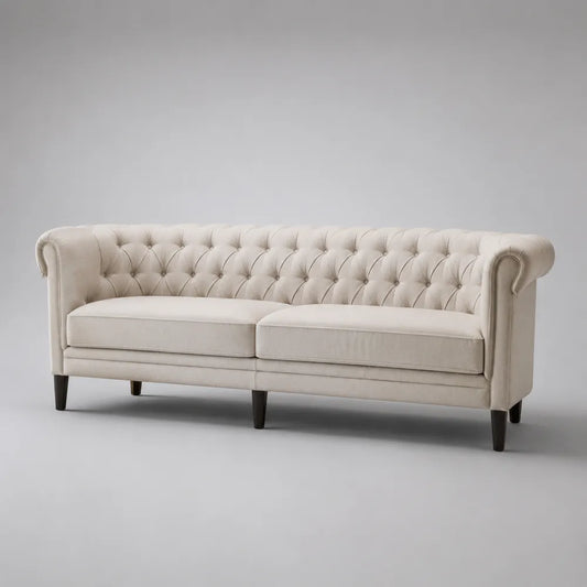 Canapé 3 places capitonné en tissu polyester beige avec accoudoirs roulés et pieds en bois 230 x 90 x 80 cm
